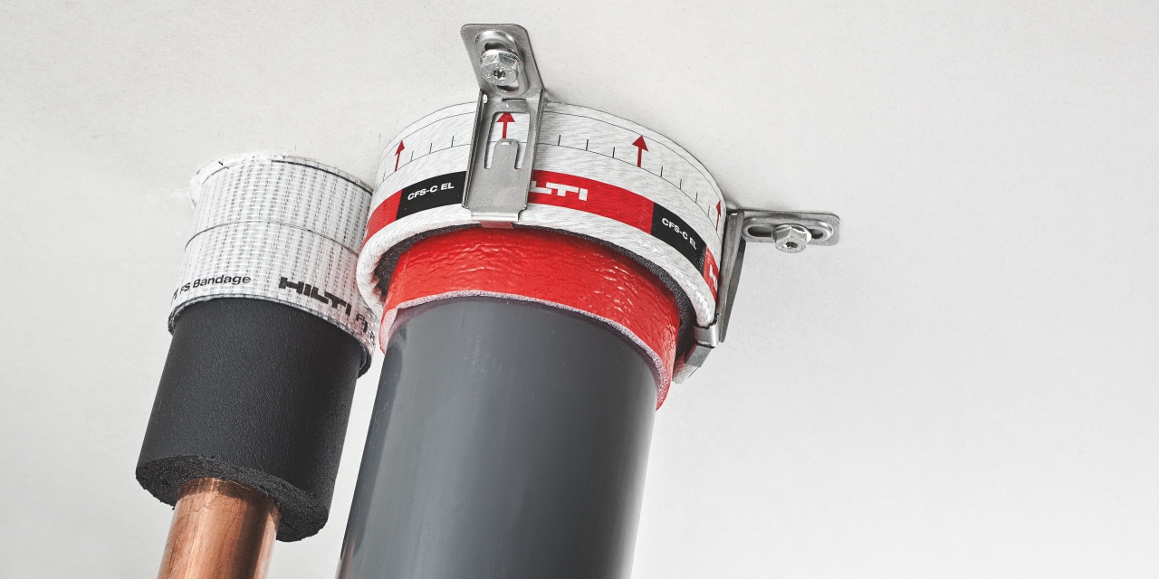 Photo of a CFS-B Firestop bandage and a CFS C-EL Firestop endless collar around mechanical pipes