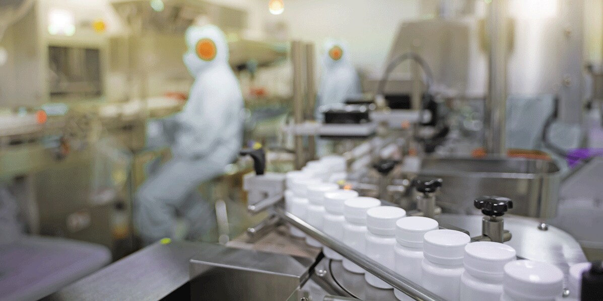 Transfer medicine bottles on the conveyor belt in the pharmaceutical industry, industrial machinery for the quality of medical products. Industrial concept and factory technology.shallow focus effect. Transfer medicine bottles on the conveyor belt in the pharmaceutical industry, industrial machinery for the quality of medical products. Industrial concept and factory technology.shallow focus effect.
