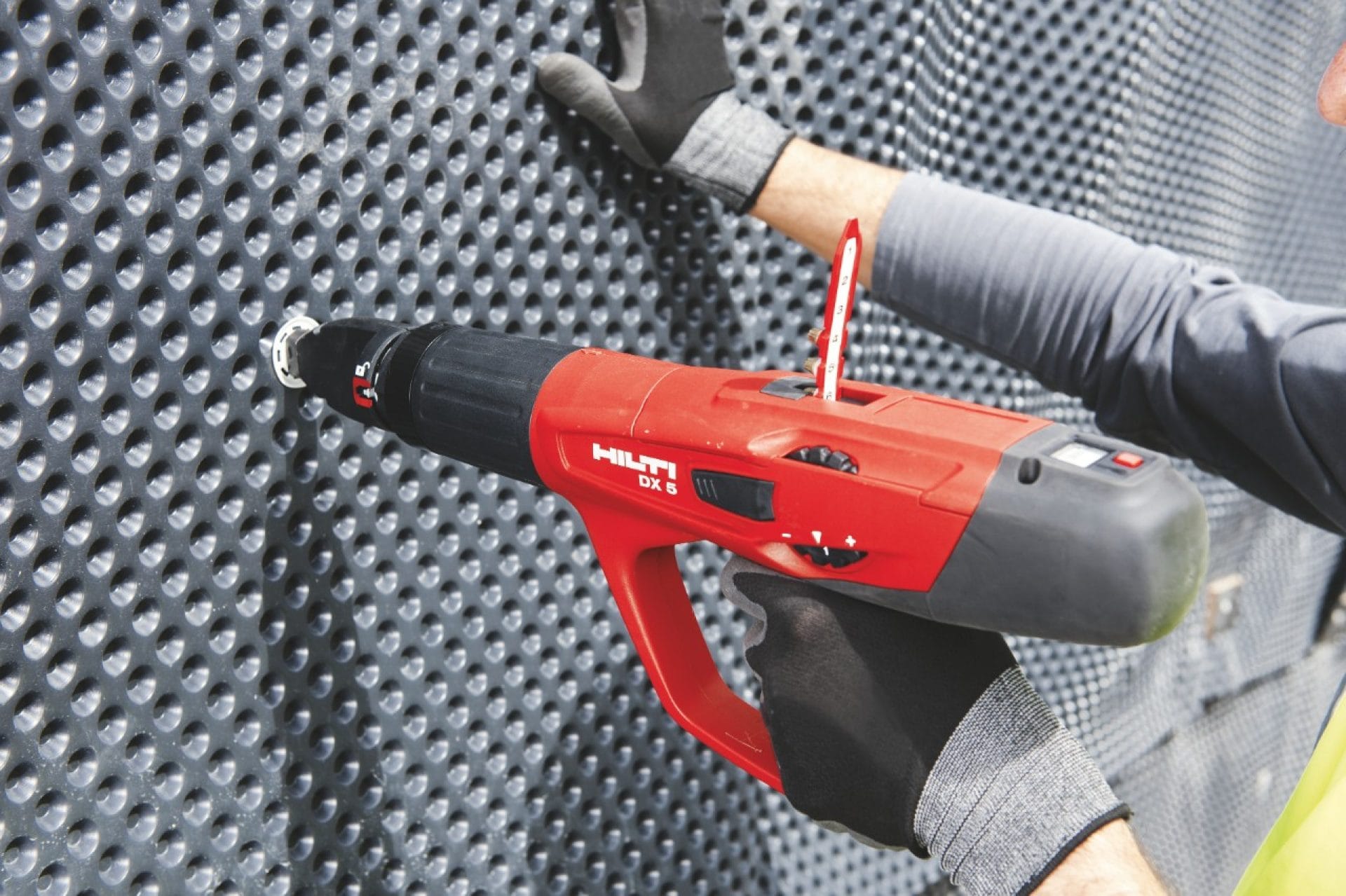 DX 5 powder-actuated tool fastening drainage membrane